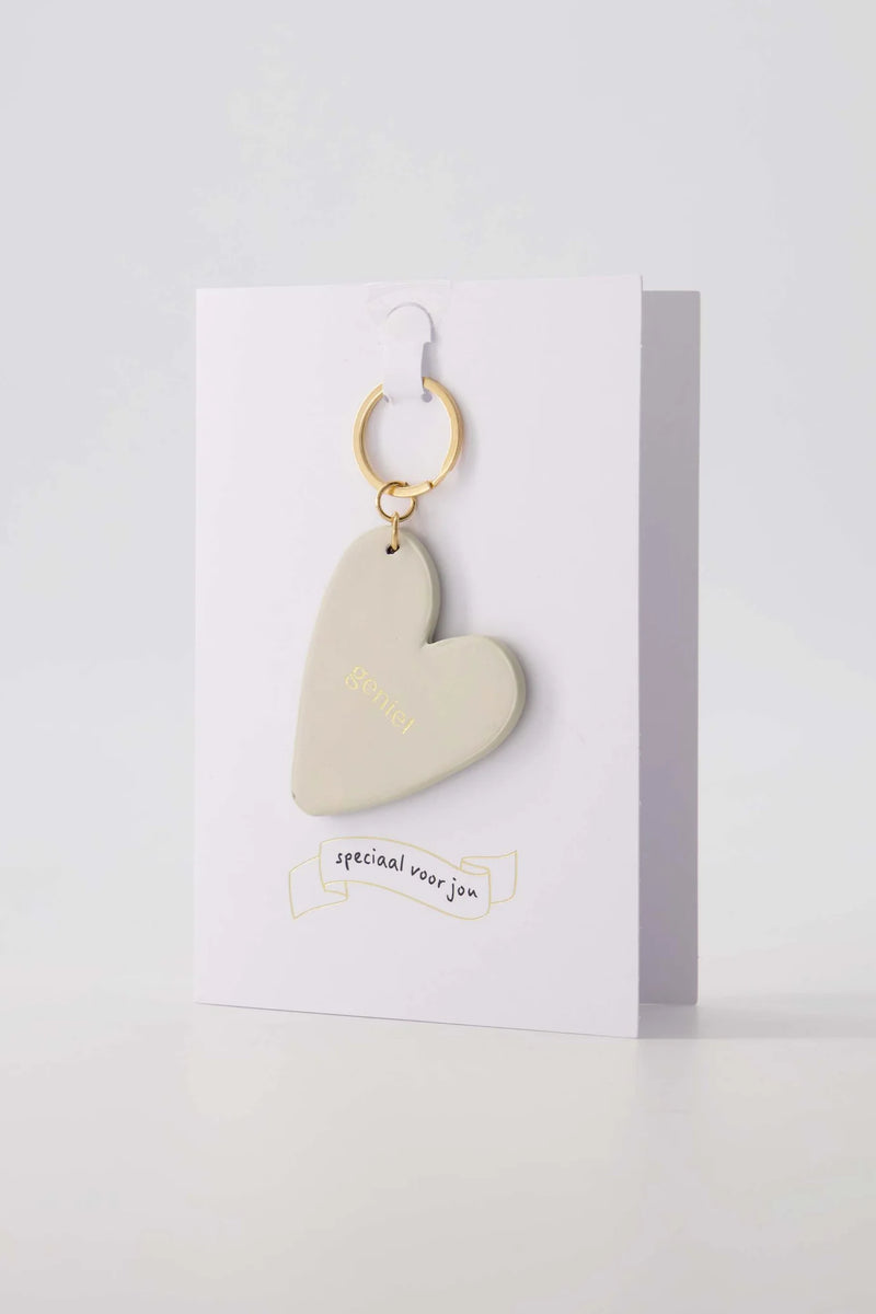 Zusss - Wenskaart Sleutelhanger Geniet - Zand